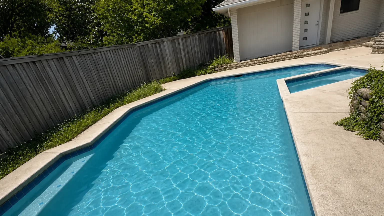 Clean resort-style pool with clear water after treatment